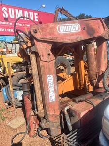 GUINDASTE MUNCK MODELO M-1050 COM BOMBA E SOBRECHASSIS